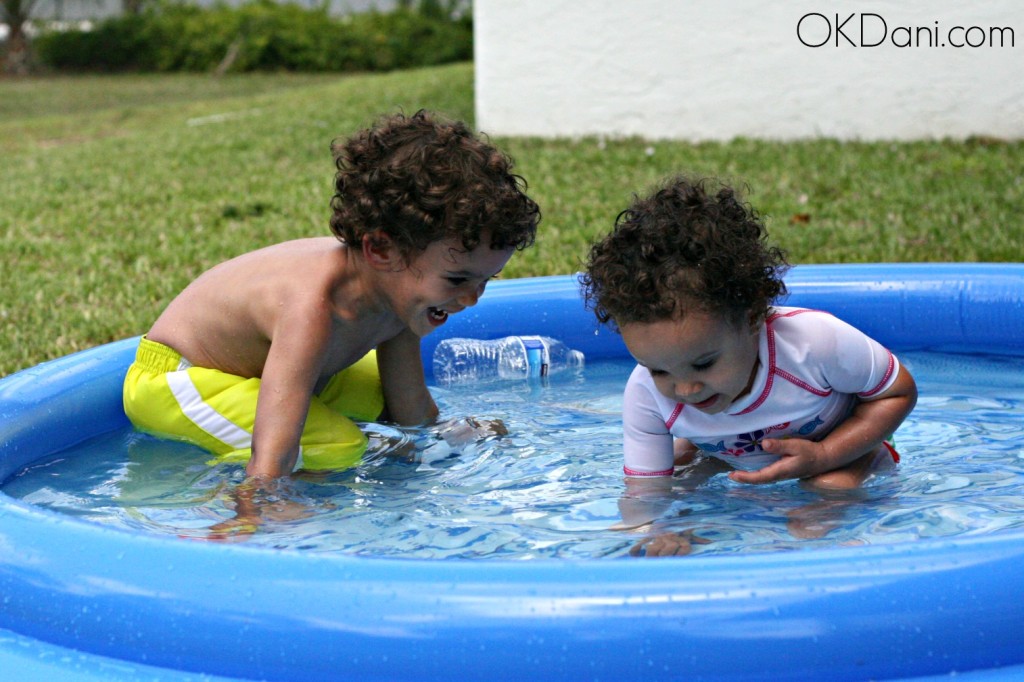 Toddlers in kiddie pool